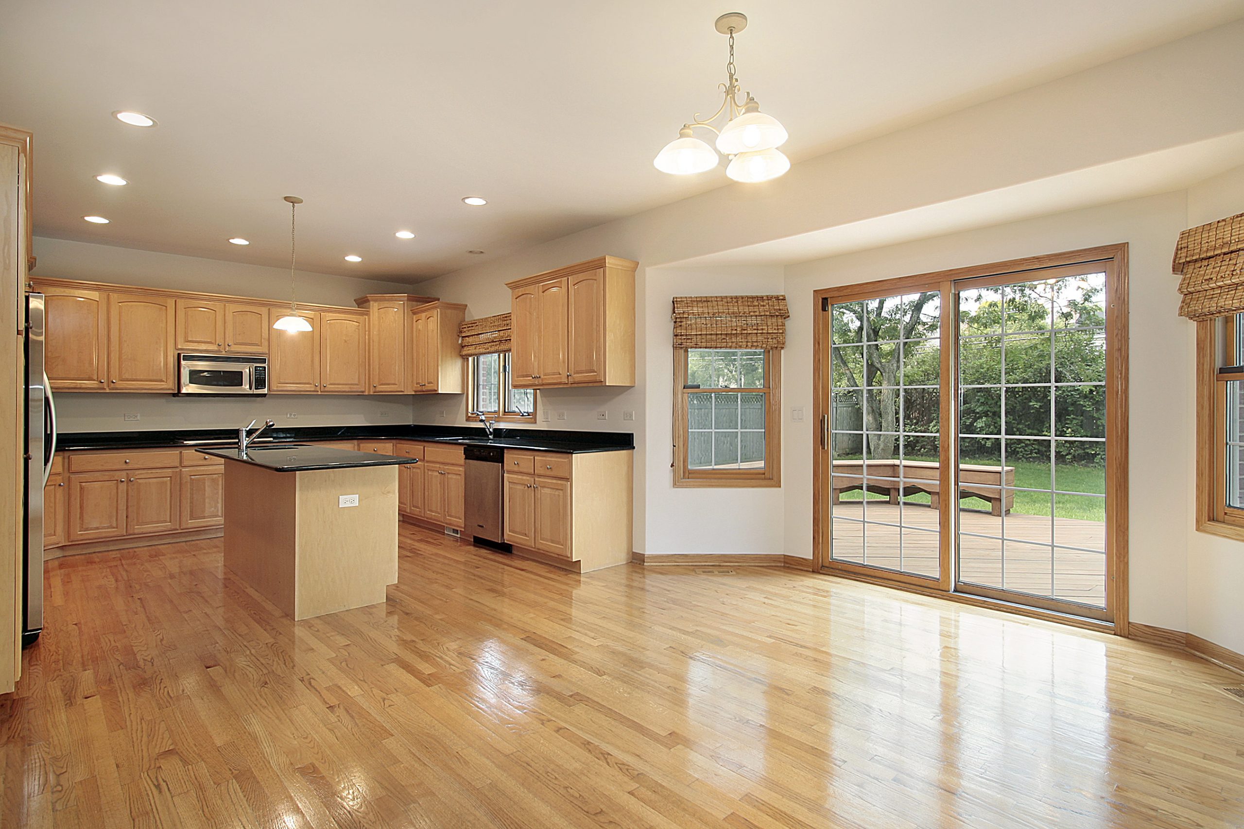 wooden floor and kitchen cabinets